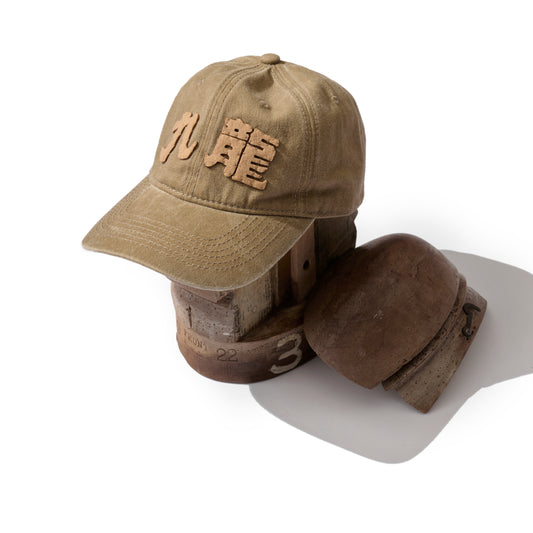 FADED WASHED HAND QUILTED “KOWLOON” CAP / DESERT TAN