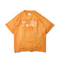 SUN FADED HAND STENCIL WASHED “KOWLOON” TEE / SIGNAL ORANGE