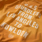 SUN FADED HAND STENCIL WASHED “KOWLOON” TEE / SIGNAL ORANGE