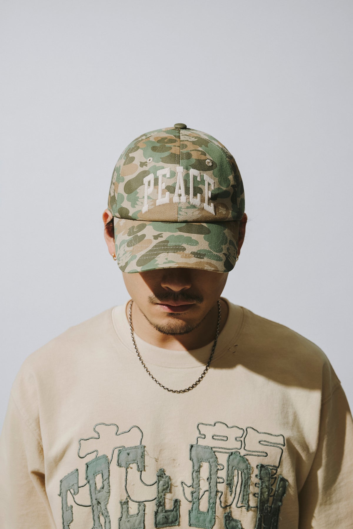 F&P “PEACE” OVERPRINT CAP / CAMO